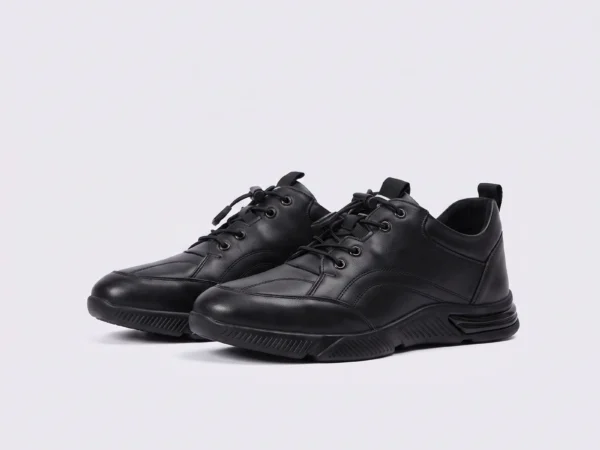 genuine leather lace-up casual sneakers warm comfortable in black, front 45-degree view of the pair on a light gray background