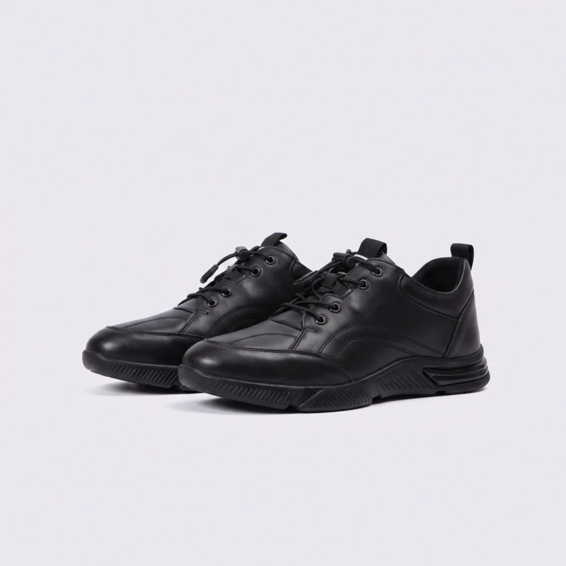 genuine leather lace-up casual sneakers warm comfortable in black, front 45-degree view of the pair on a light gray background