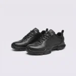 genuine leather business casual sneakers lightweight comfortable non-slip walking shoes in black, front 45-degree view of the pair on a light gray background
