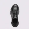 genuine leather business casual sneakers lightweight comfortable non-slip walking shoes in black, top-down view of the pair on a light gray background