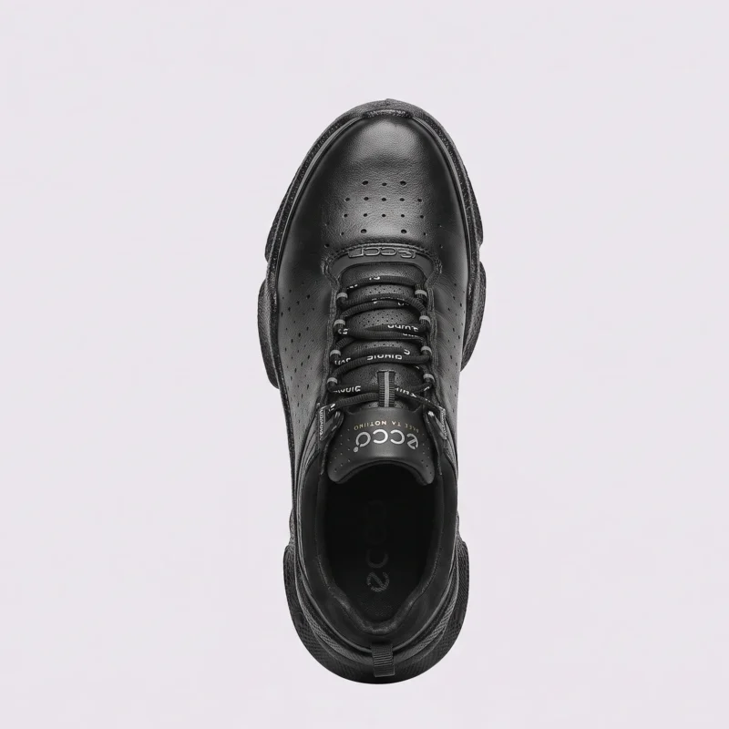 genuine leather business casual sneakers lightweight comfortable non-slip walking shoes in black, top-down view of the pair on a light gray background