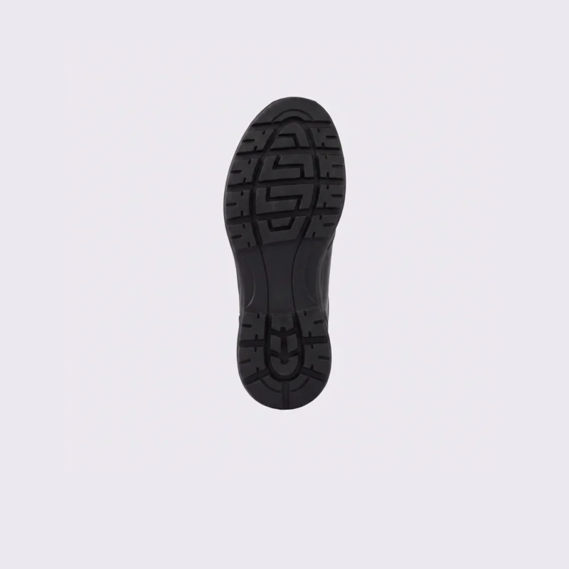 genuine leather business casual running sneakers in black, outsole tread view on a light gray background