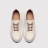 genuine leather platform sneakers, top-down view of the pair on a light gray background