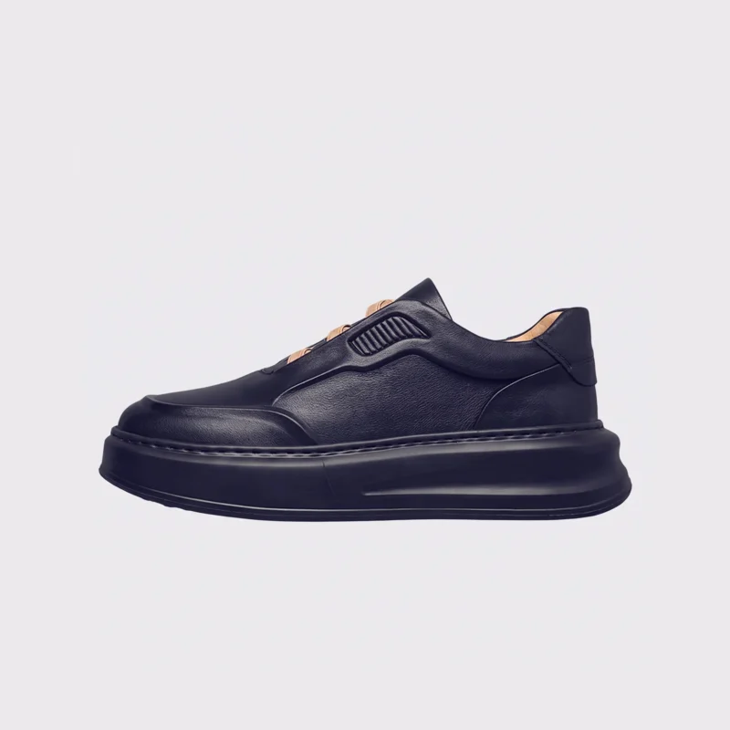 genuine leather platform sneakers in black, left side profile view on a light gray background