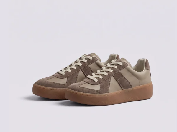 retro platform german trainer sneakers in brown, front 45-degree view of the pair on a light gray background