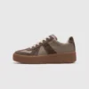 retro platform german trainer sneakers in brown, left side profile view on a light gray background