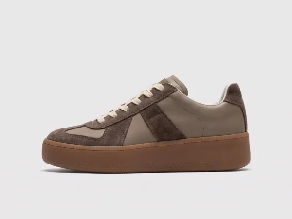 retro platform german trainer sneakers in brown, left side profile view on a light gray background