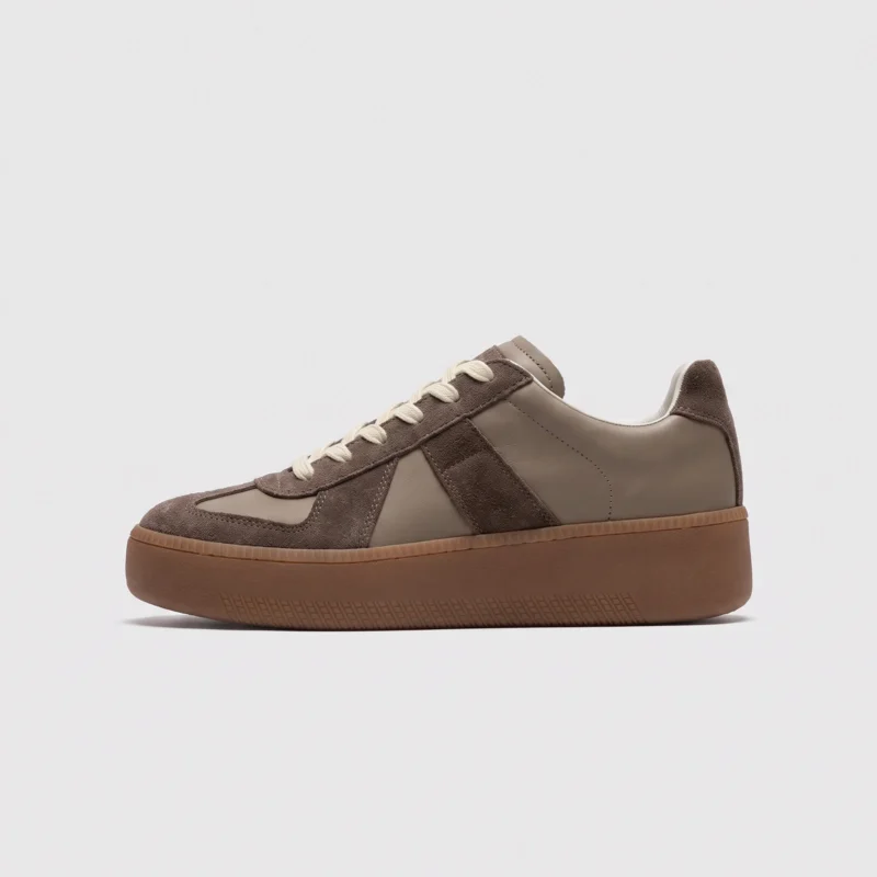 retro platform german trainer sneakers in brown, left side profile view on a light gray background