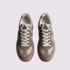 retro platform german trainer sneakers in brown, top-down view of the pair on a light gray background