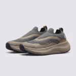 slip-on breathable running sneakers lightweight cushioned casual shoes in green, front 45-degree view of the pair on a light gray background