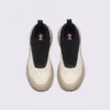 slip-on breathable running sneakers lightweight cushioned casual shoes in khaki, top-down view of the pair on a light gray background
