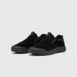 slip-on work safety shoes lightweight suede anti-slip driving shoes in black, front 45-degree view of the pair on a light gray background