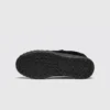 slip-on work safety shoes lightweight suede anti-slip driving shoes in black, outsole tread view on a light gray background