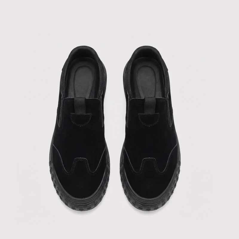 slip-on work safety shoes lightweight suede anti-slip driving shoes in black, top-down view of the pair on a light gray background