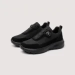 trendy rotating dial closure casual sneakers breathable chunky sole commuter shoes in black, front 45-degree view of the pair on a light gray background