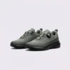trendy rotating dial closure casual sneakers breathable chunky sole commuter shoes in green, front 45-degree view of the pair on a light gray background
