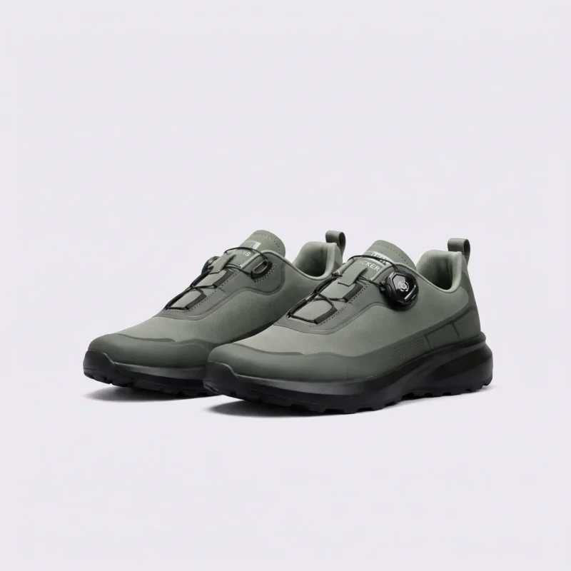 trendy rotating dial closure casual sneakers breathable chunky sole commuter shoes in green, front 45-degree view of the pair on a light gray background