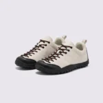 wide toe box barefoot hiking sneakers in beige, front 45-degree view of the pair on a light gray background