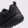 wide toe box barefoot hiking sneakers in black, close-up view of the heel on a light gray background