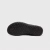 wide toe box barefoot hiking sneakers in black, outsole tread view on a light gray background