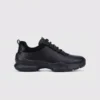 leather breathable hiking walking shoes lightweight non-slip outdoor sneakers in black, right side profile view on a light gray background