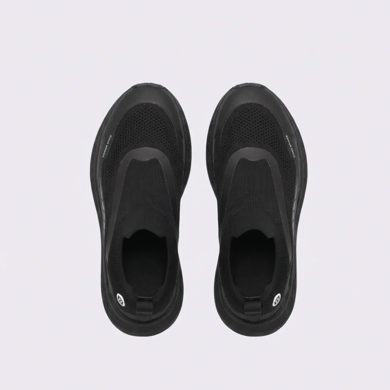 leather breathable hiking walking shoes lightweight non-slip outdoor sneakers in black, top-down view of the pair on a light gray background